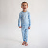 Soft bamboo baby pajamas in blue wave print, eco-friendly sleepwear.