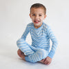 Soft bamboo baby pajamas in blue wave print, eco-friendly sleepwear.