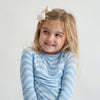 Soft bamboo baby pajamas in blue wave print, eco-friendly sleepwear.