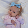 Soft bamboo baby pajamas in pink floral print, eco-friendly sleepwear.